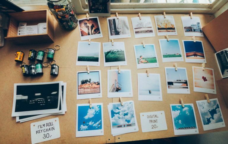 a wall with pictures and a wall with text