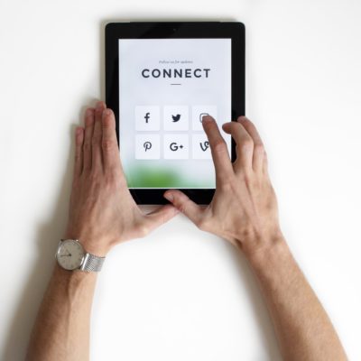 a person holding a tablet