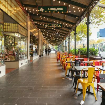 a long row of tables and chairs