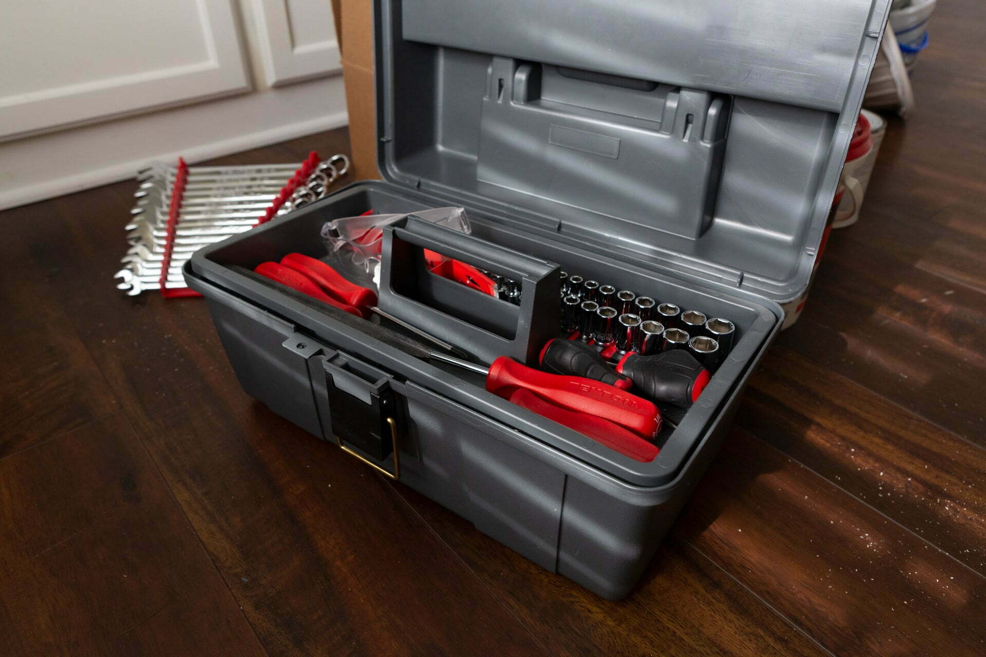 a stove with a red hood