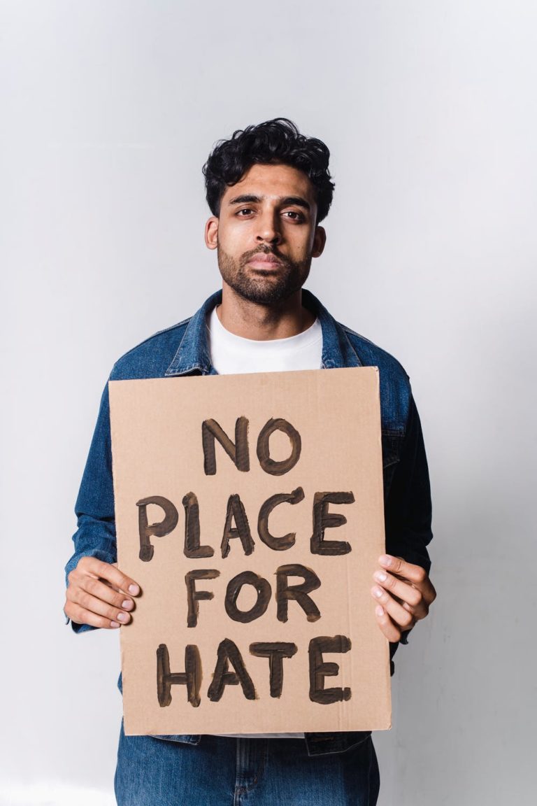 a man holding a sign